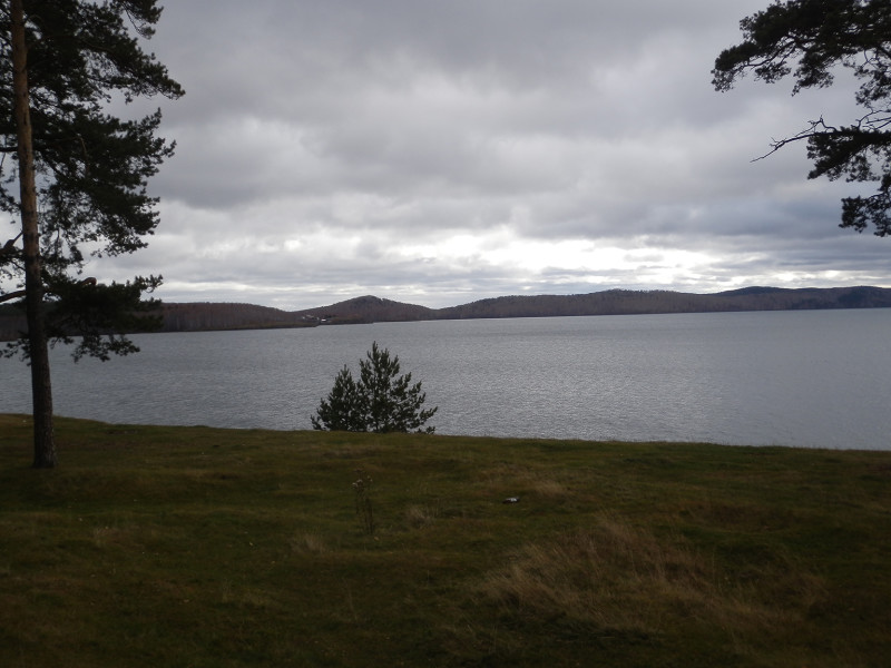 Leaden clouds above Itkul lake on the the shore at Dautovo village