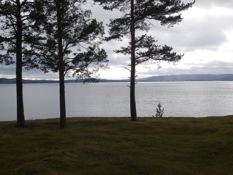 Leaden clouds above Itkul lake on the the shore at Dautovo village