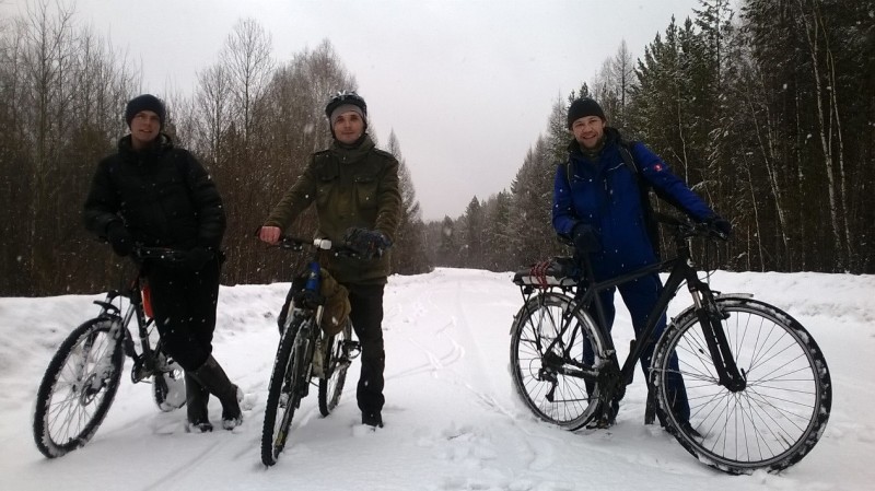 Bicycles riders on the way to Large Lavrovka village